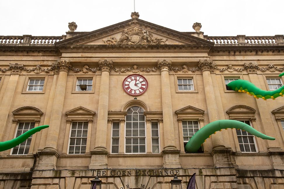 The clock at the Bristol stock exchange building with its two minute hands, one being ten minutes behind