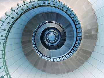 A spiral staircase seen from above forms a circle