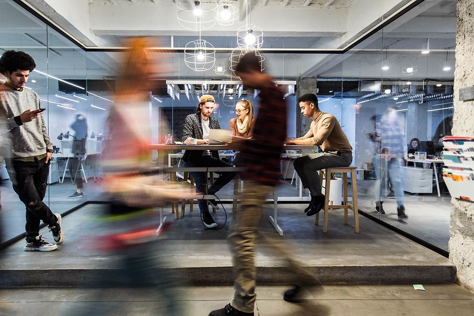 Modern office spaces, young people working 